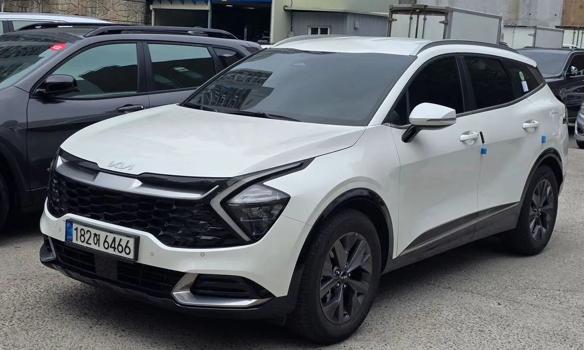 Kia Sportage — фото 1