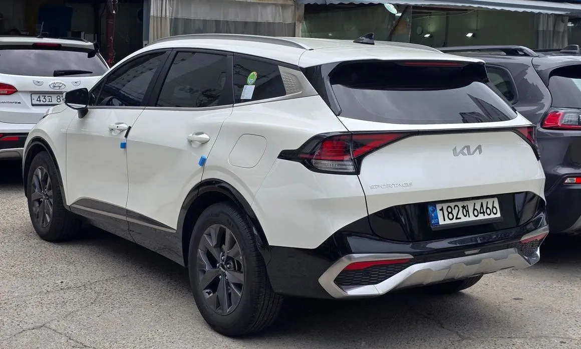 Kia Sportage — фото 8
