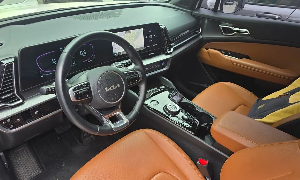 Kia Sportage — фото 7