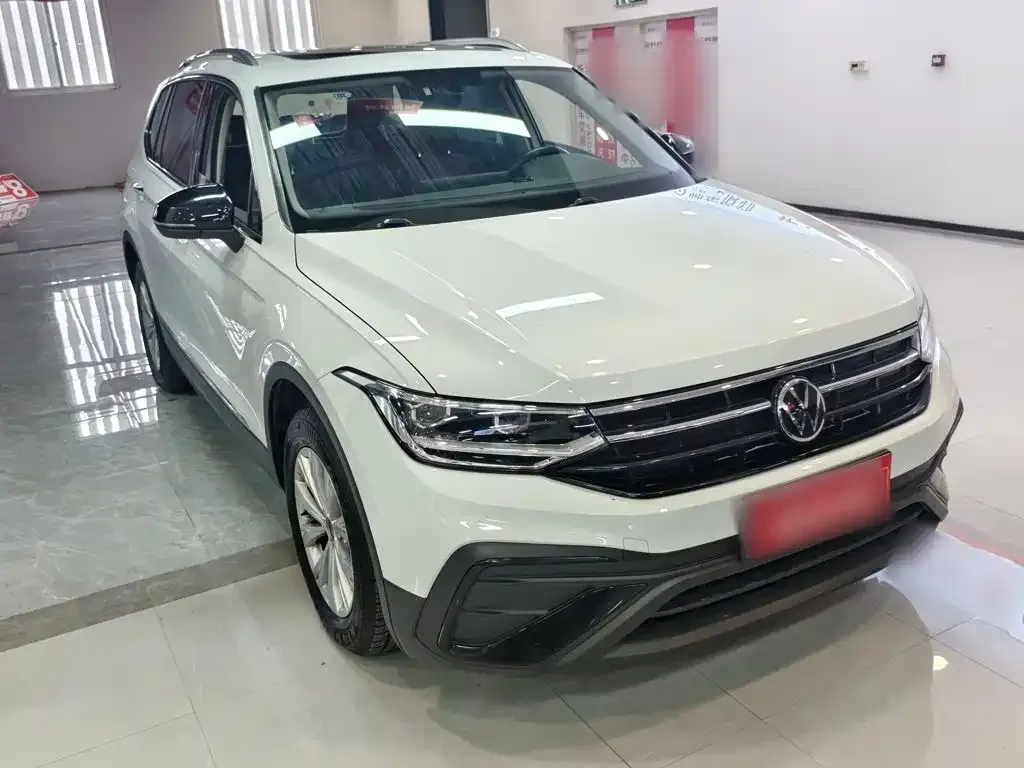 Volkswagen Tiguan L — фото 5