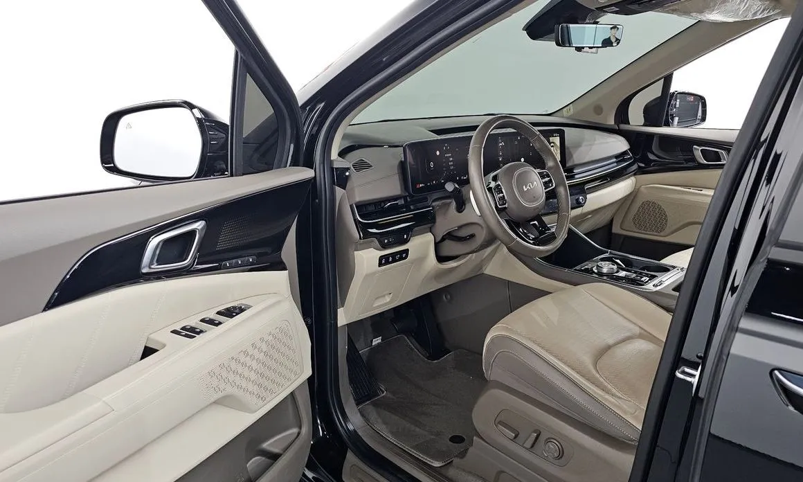 Kia Carnival — фото 10