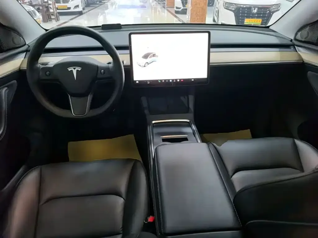 Tesla Model Y — фото 6