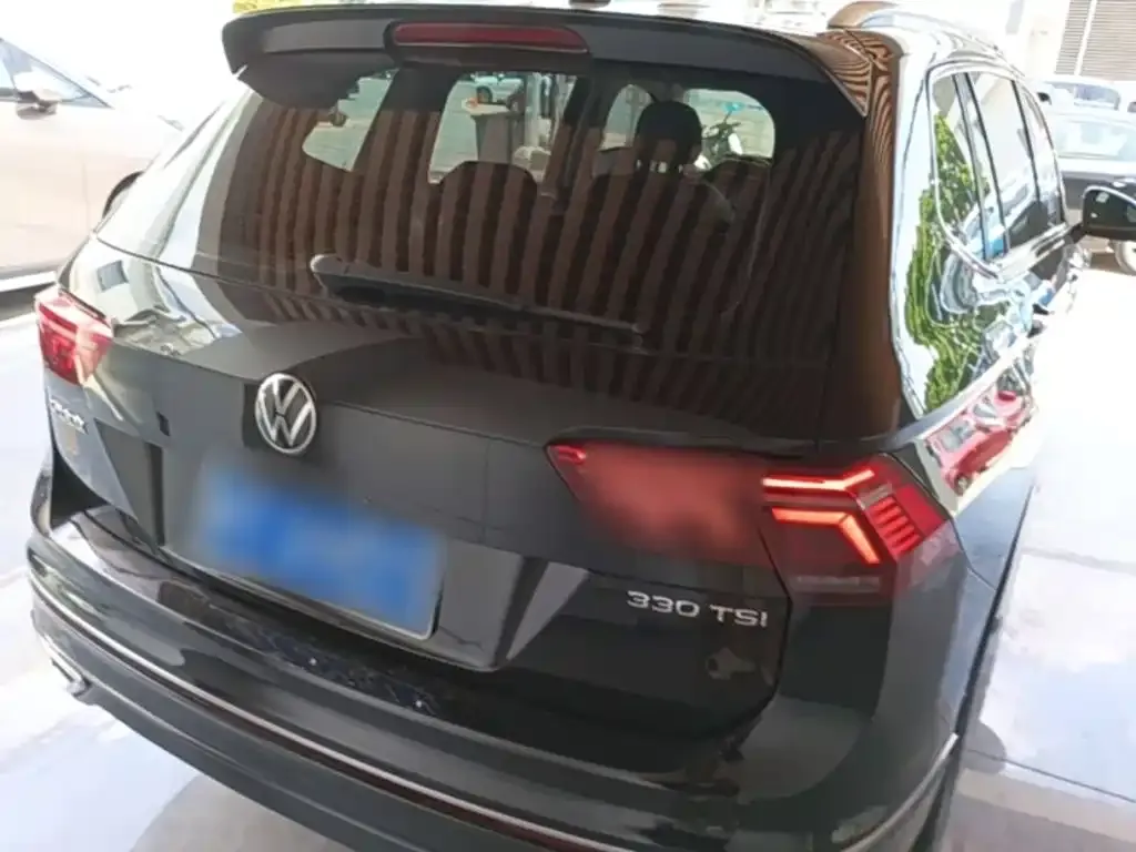 Volkswagen Tiguan L — фото 5