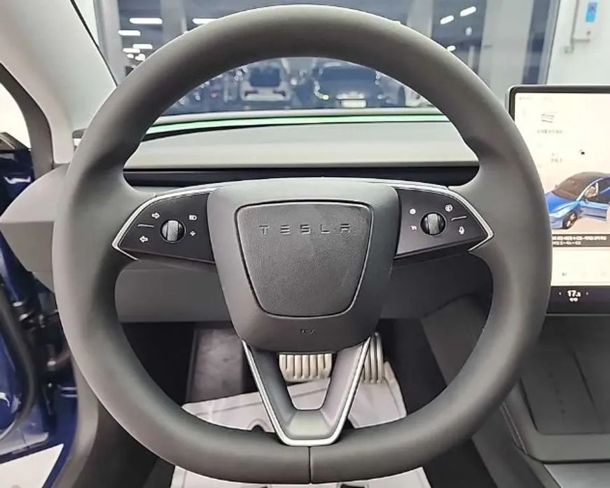 Tesla Model 3 — фото 9