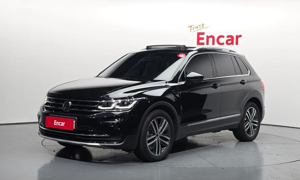 Volkswagen Tiguan — фото 1