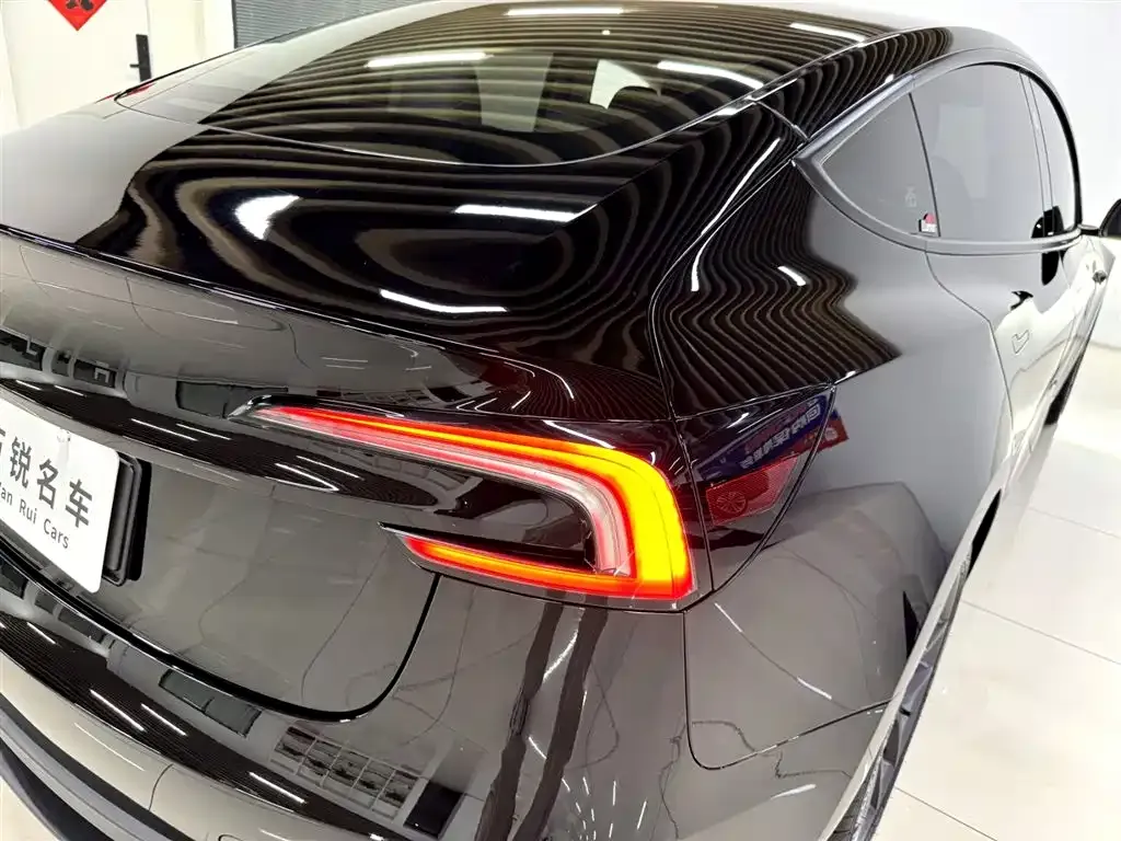 Tesla Model 3 — фото 10