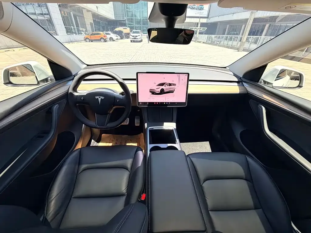 Tesla Model Y — фото 7