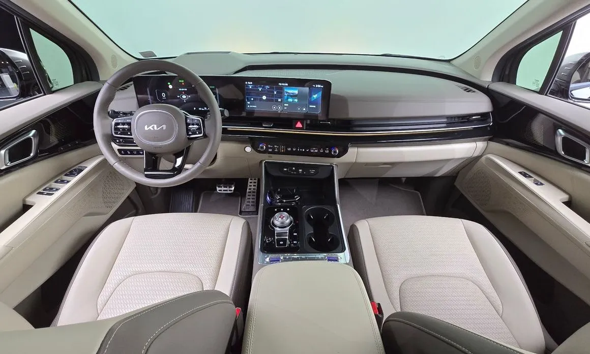 Kia Carnival — фото 10