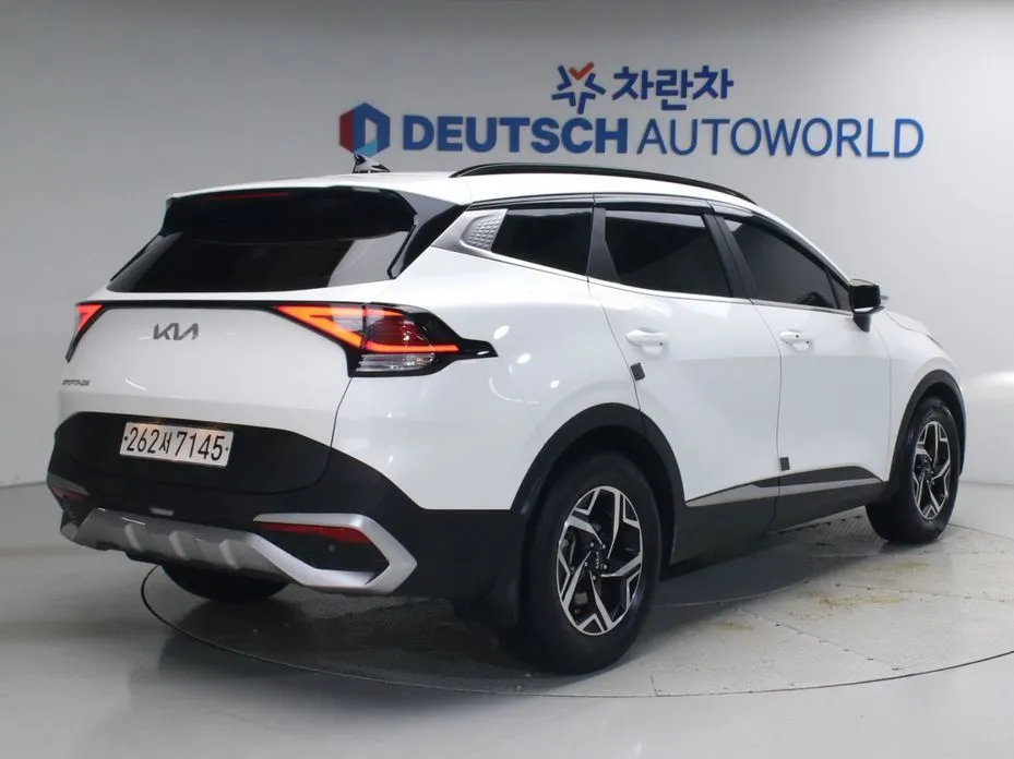 Kia Sportage — фото 8
