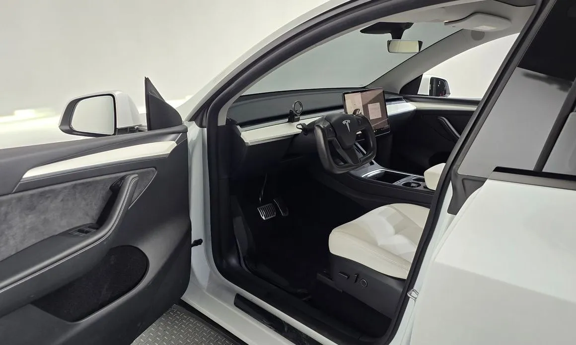 Tesla Model Y — фото 7