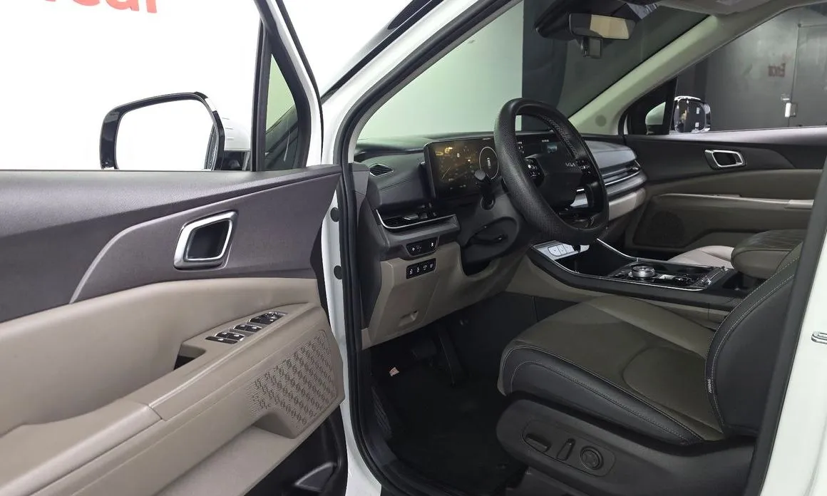 Kia Carnival — фото 10