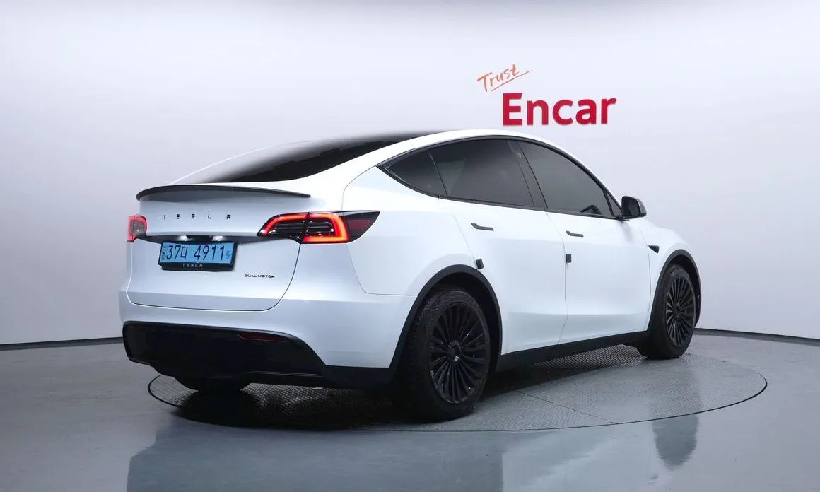 Tesla Model Y — фото 7