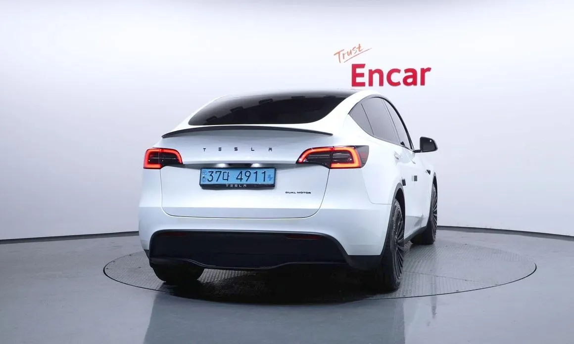 Tesla Model Y — фото 6