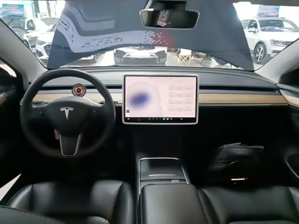 Tesla Model 3 — фото 7