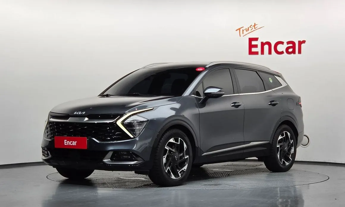 Kia Sportage — фото 1