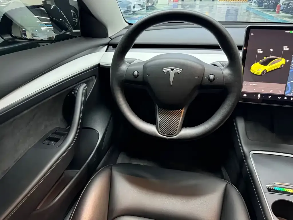Tesla Model 3 — фото 7