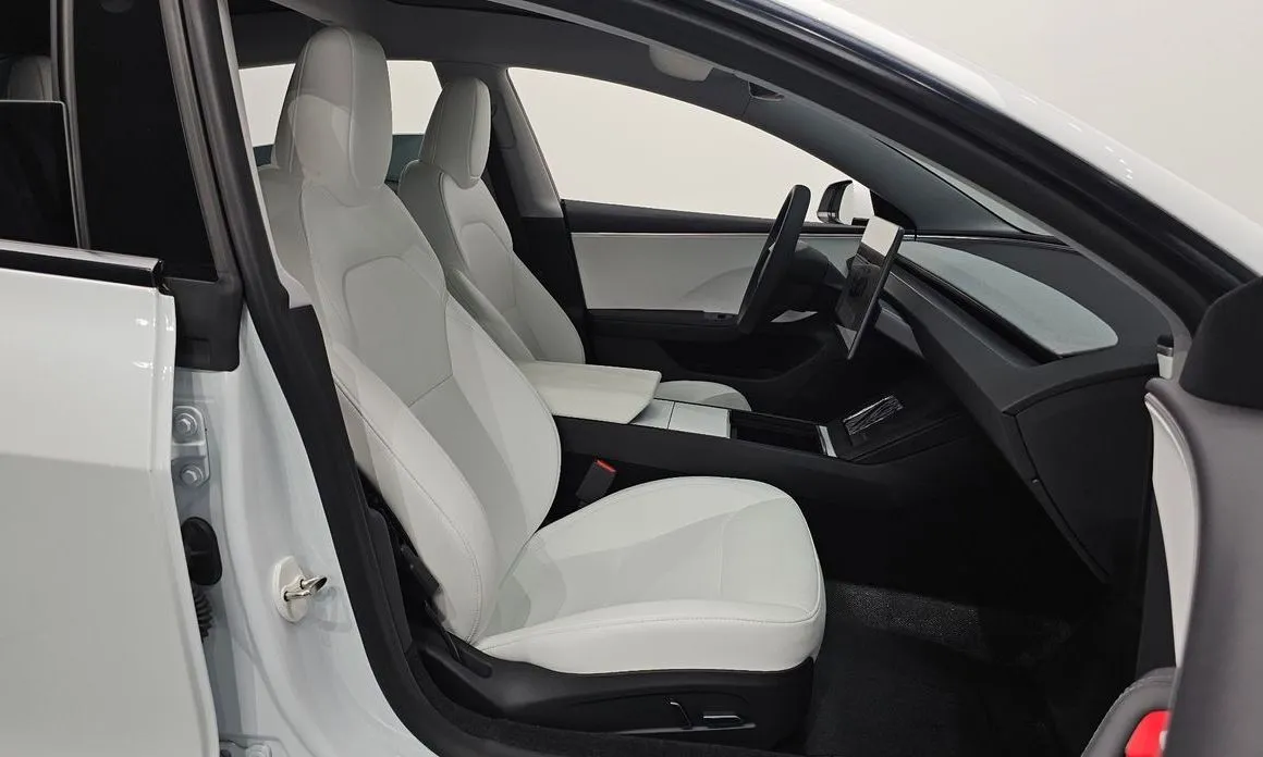 Tesla Model 3 — фото 10