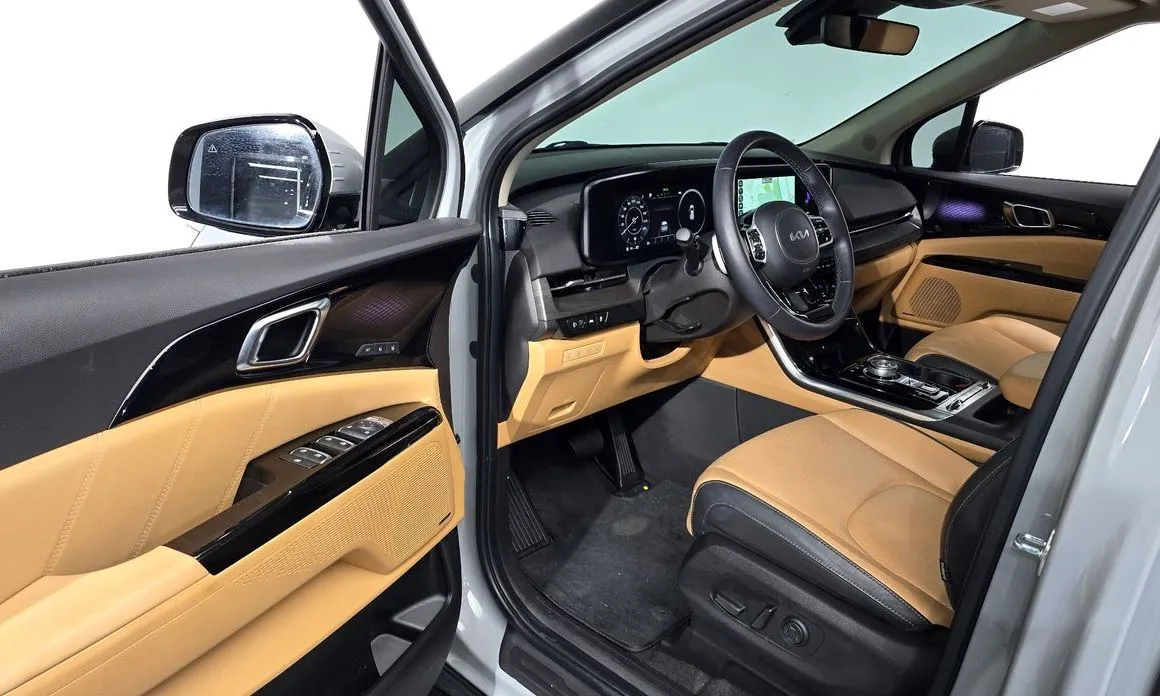 Kia Carnival — фото 10