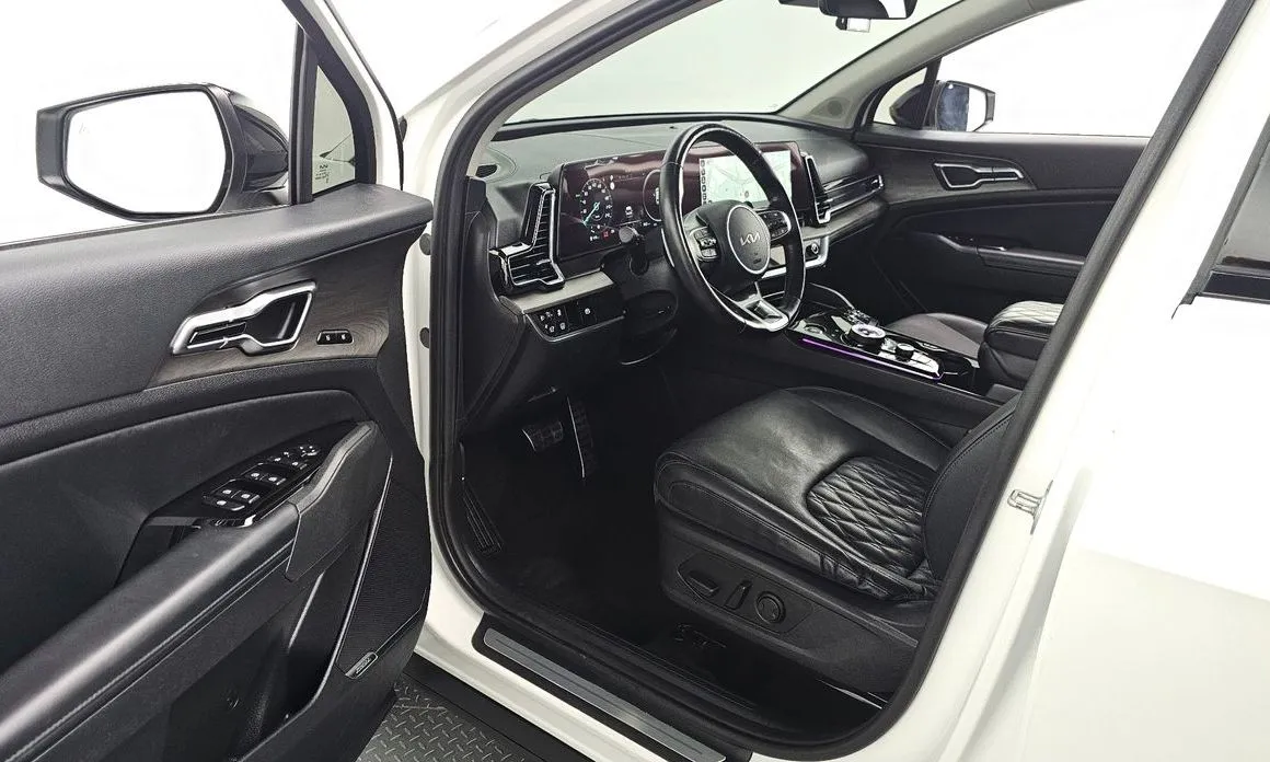 Kia Sportage — фото 10
