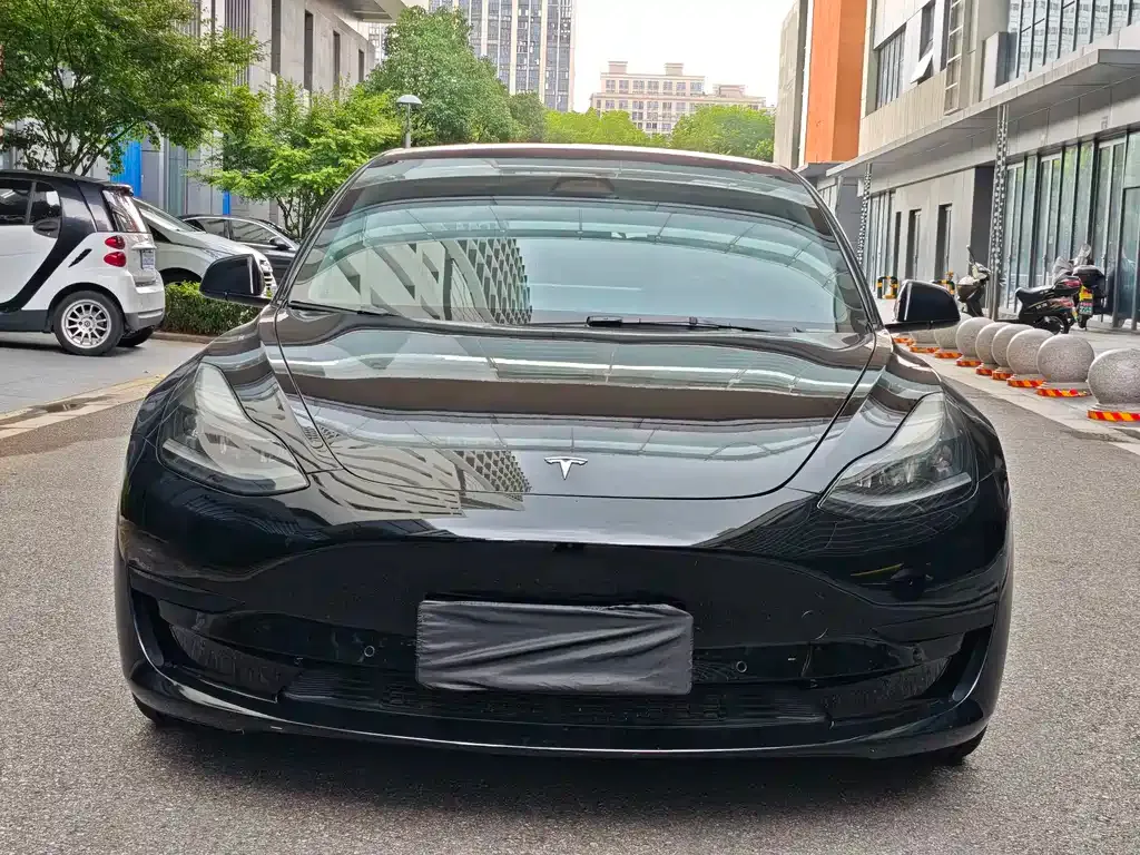Tesla Model 3 — фото 7