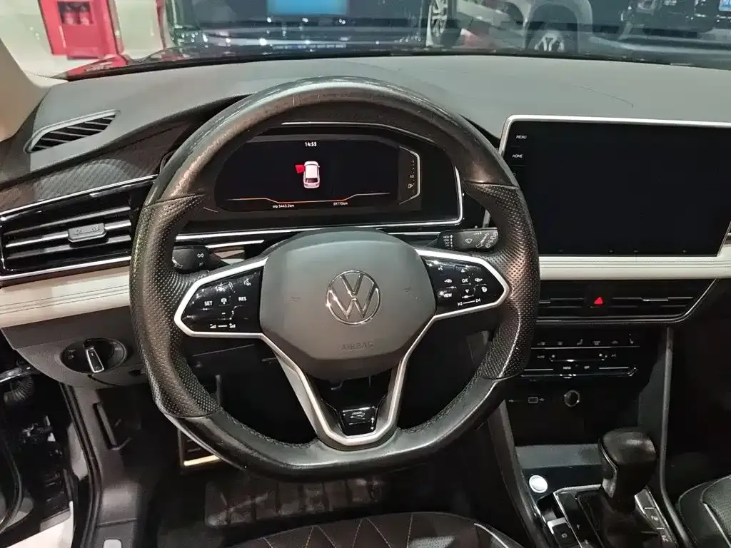 Volkswagen Tiguan L — фото 6
