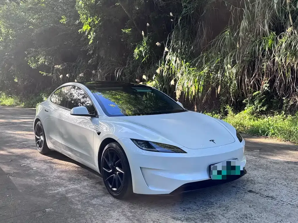 Tesla Model 3 — фото 7