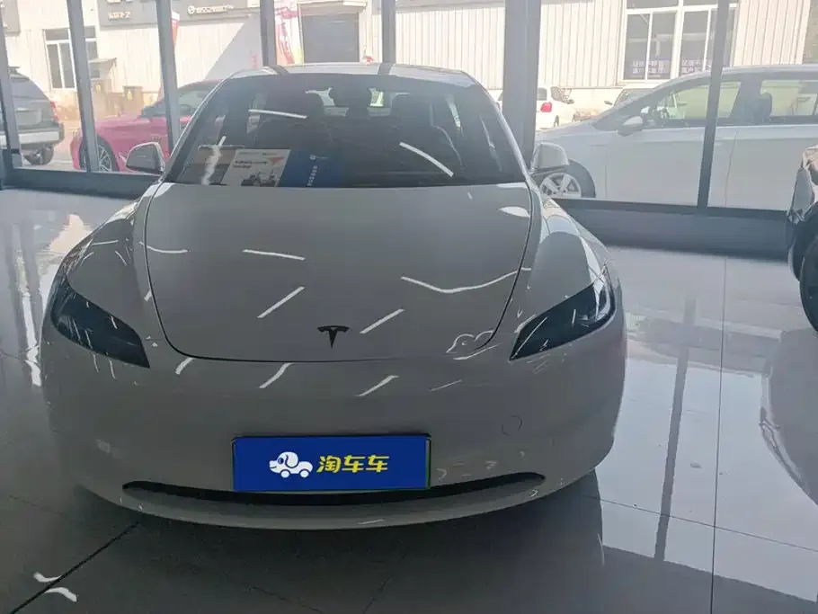 Tesla Model 3 — фото 7