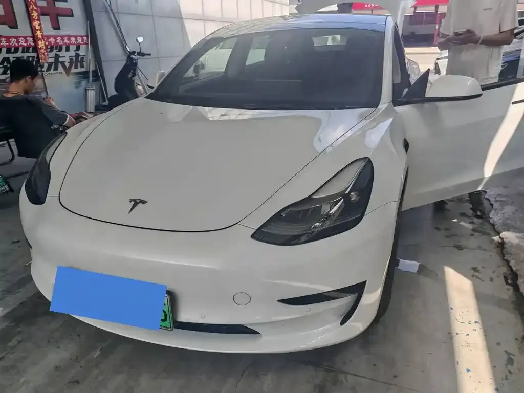Tesla Model 3 — фото 5