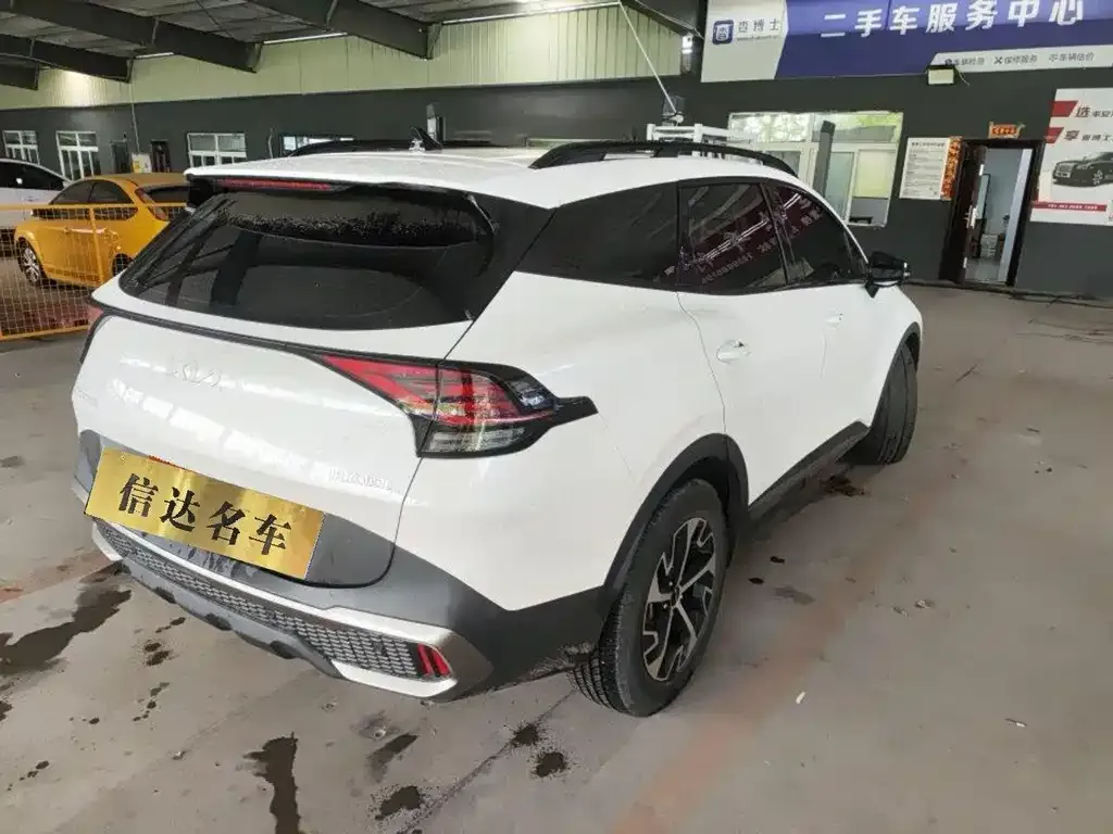 Kia Sportage — фото 7