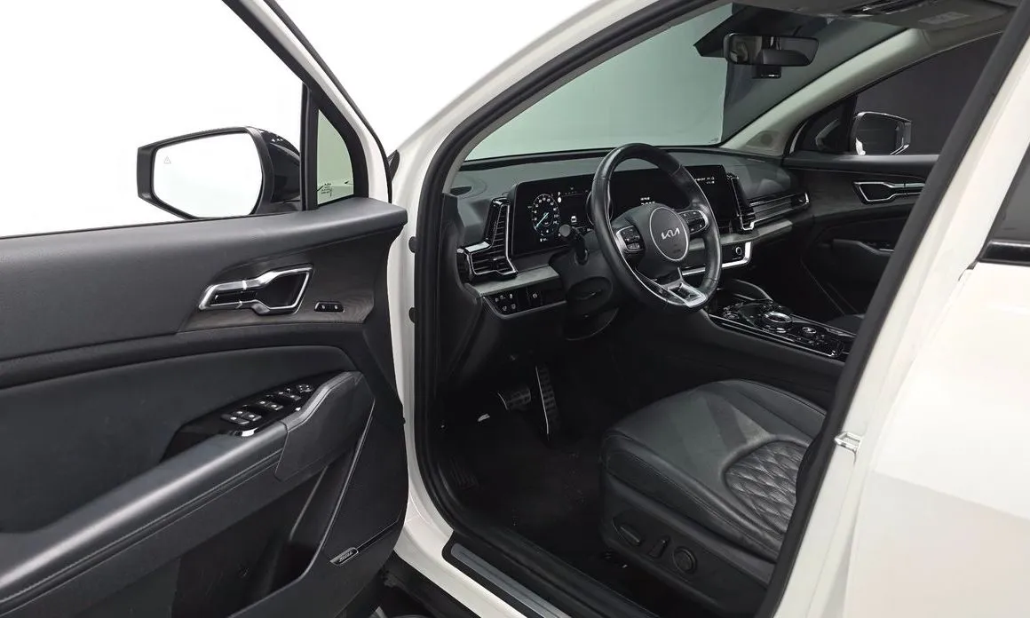 Kia Sportage — фото 7