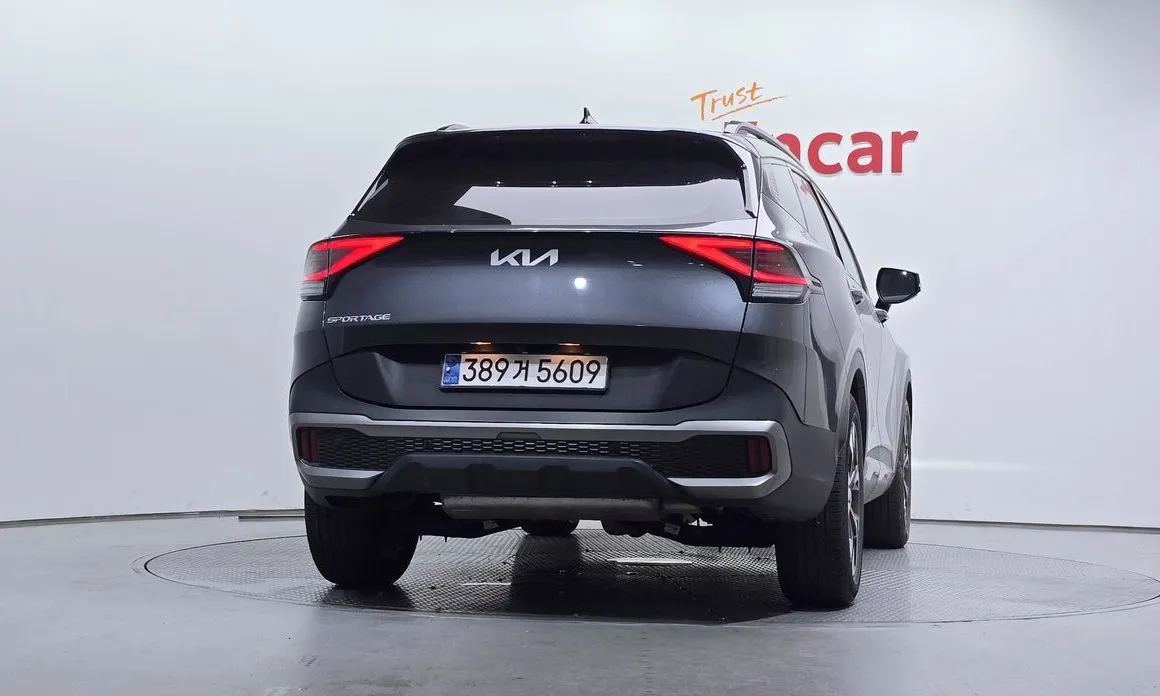 Kia Sportage — фото 7