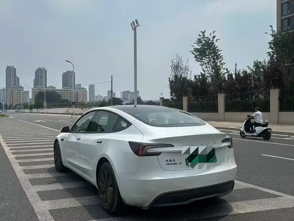 Tesla Model 3 — фото 6