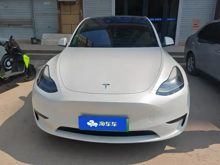 Tesla Model Y — фото 10