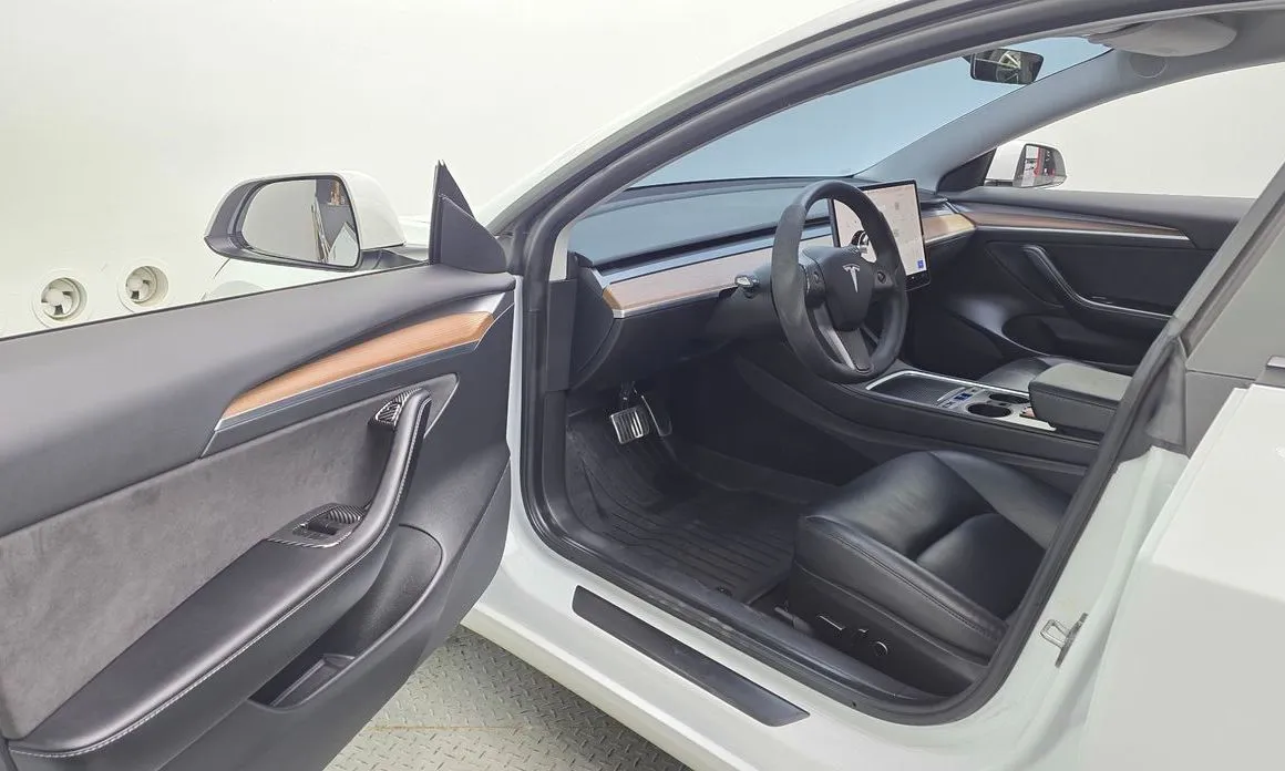 Tesla Model 3 — фото 7