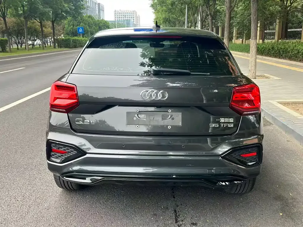 Audi Q2L — фото 6