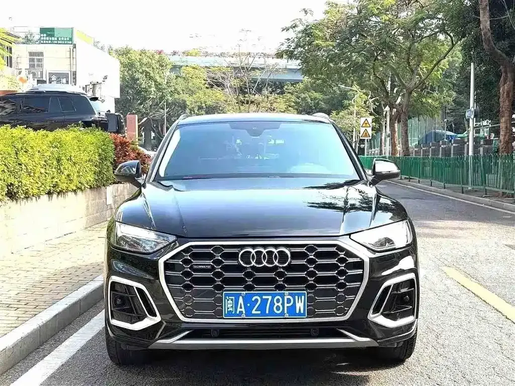 Audi Q5L — фото 5