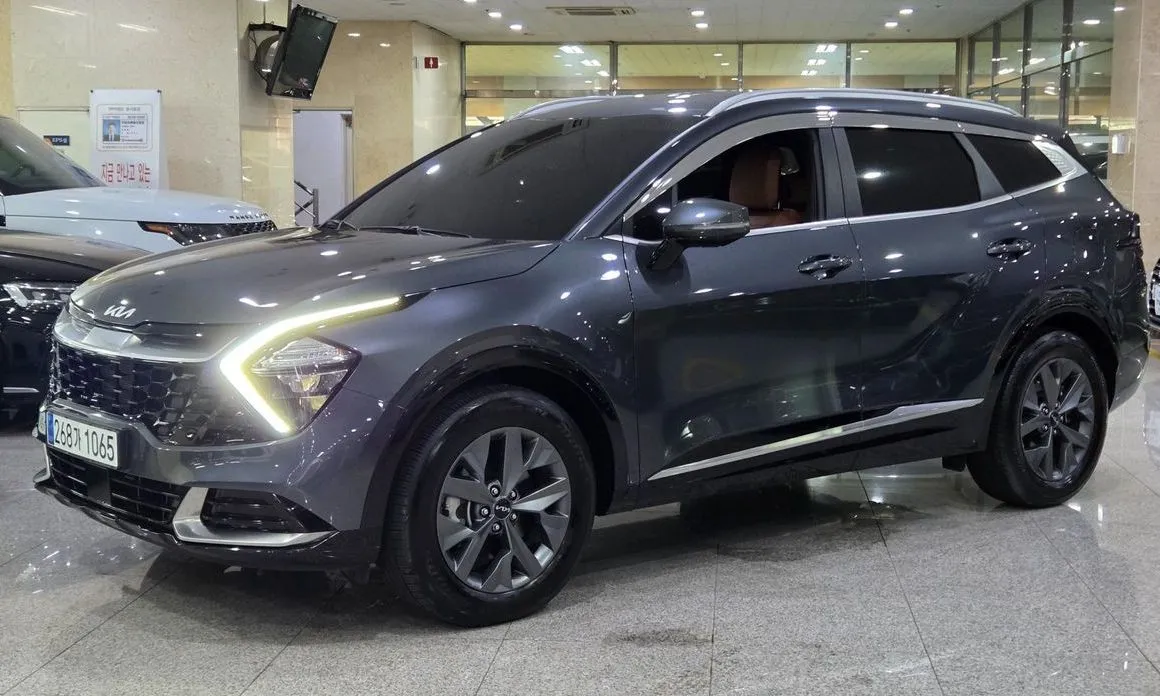 Kia Sportage — фото 1