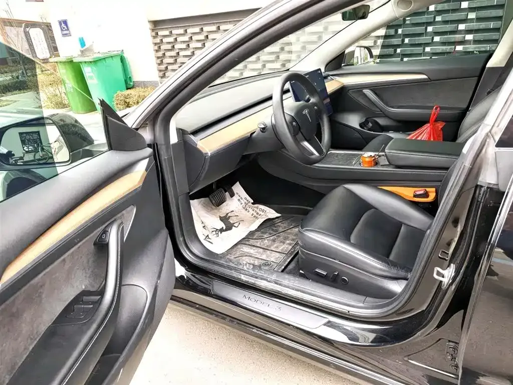 Tesla Model 3 — фото 6