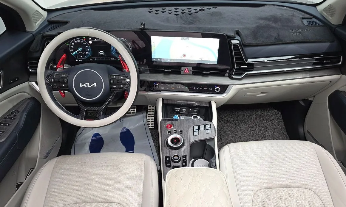 Kia Sportage — фото 9