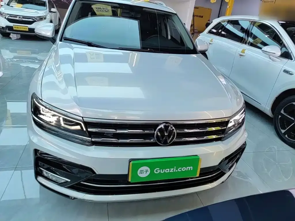 Volkswagen Tiguan L — фото 7