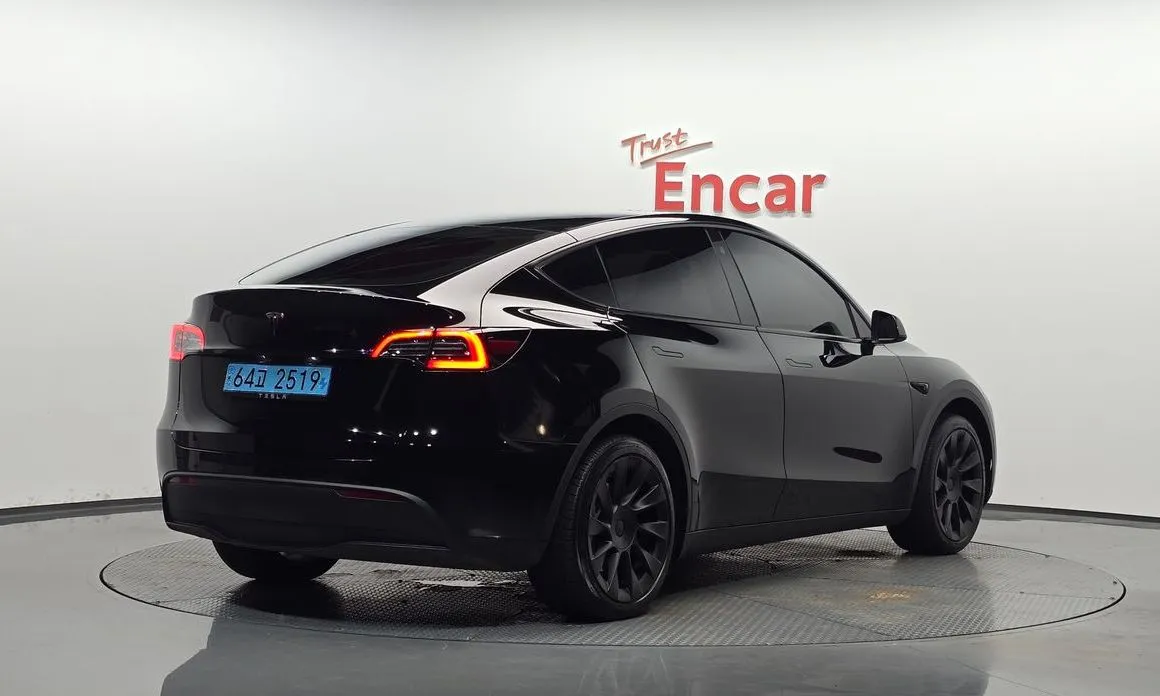 Tesla Model Y — фото 5