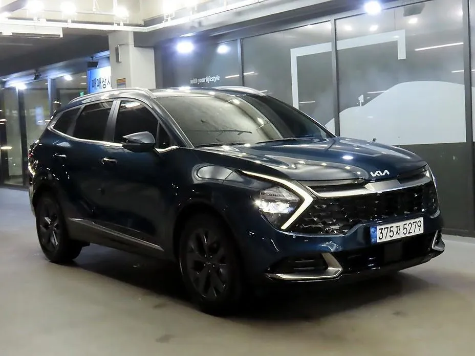 Kia Sportage — фото 1