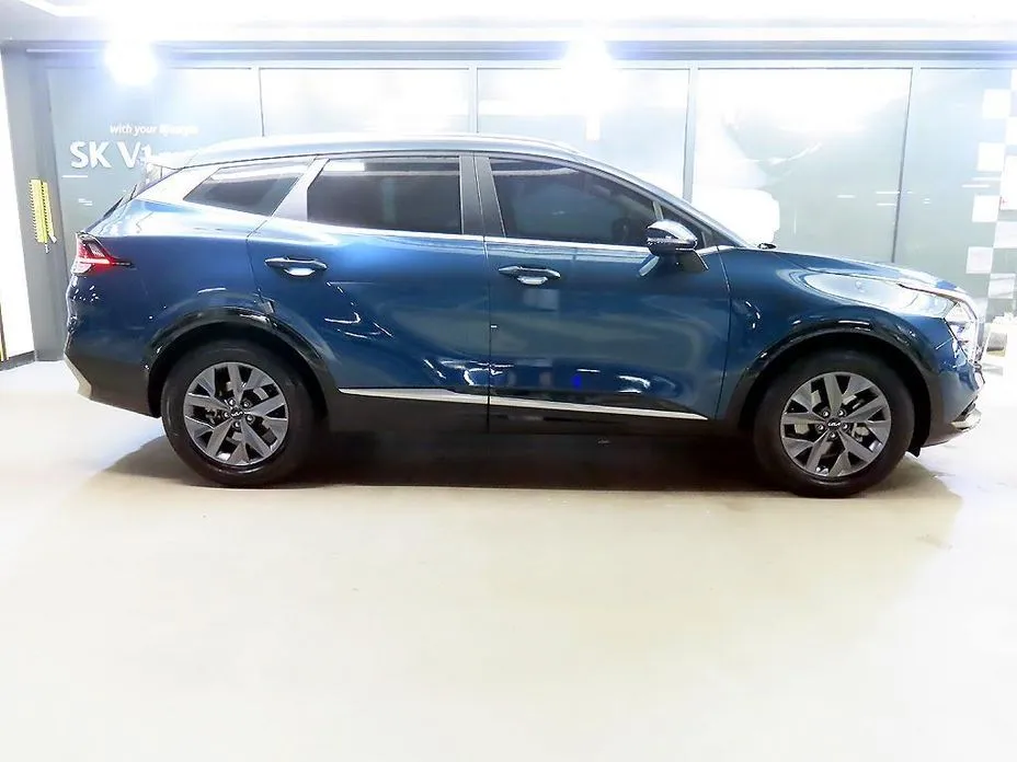 Kia Sportage — фото 7