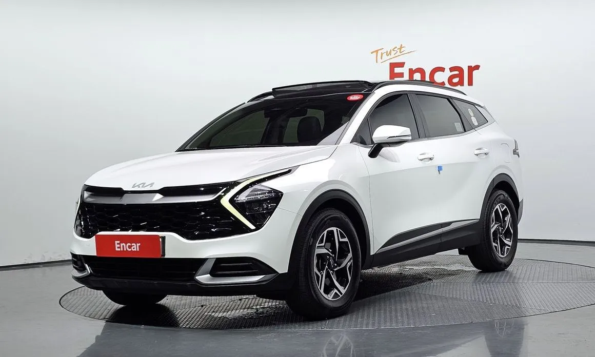 Kia Sportage — фото 1