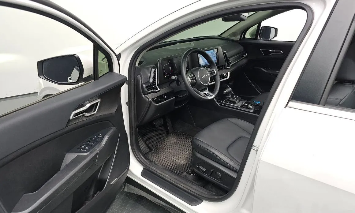Kia Sportage — фото 9
