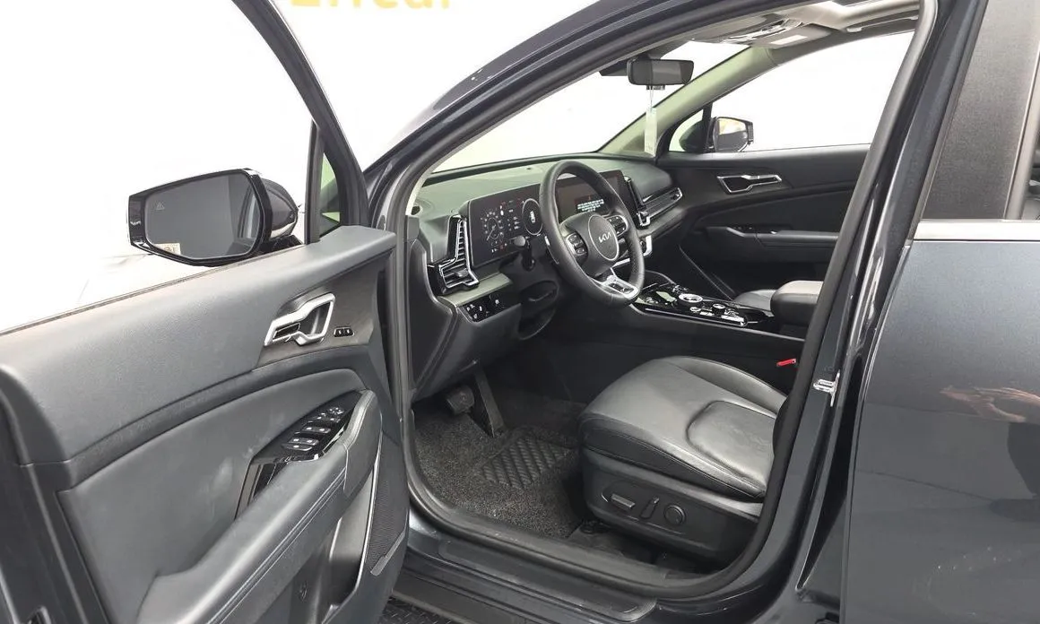Kia Sportage — фото 10