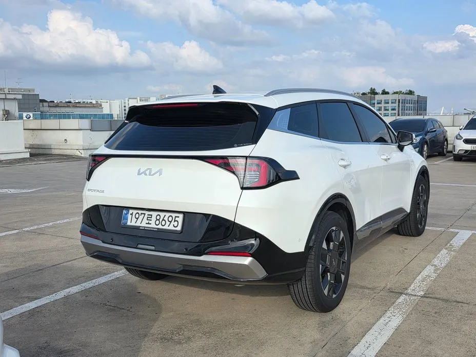 Kia Sportage — фото 8