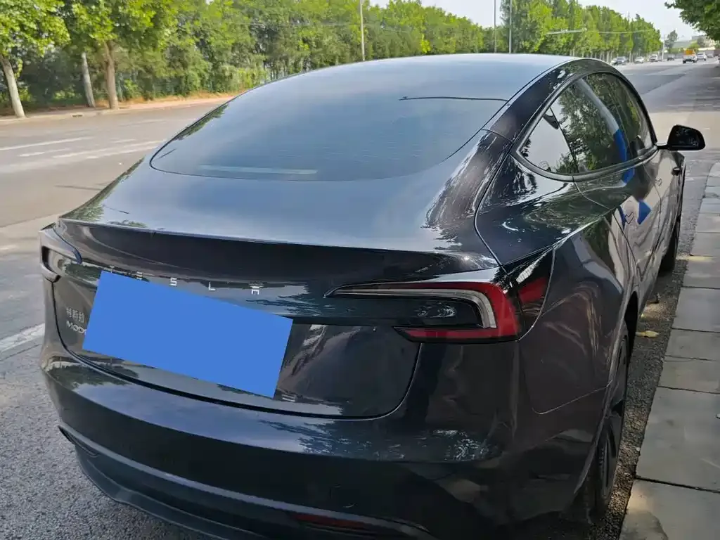 Tesla Model 3 — фото 9