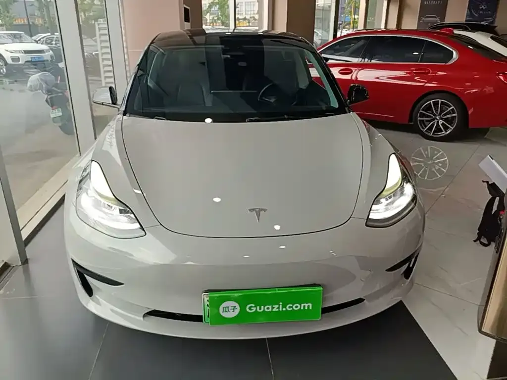 Tesla Model 3 — фото 7