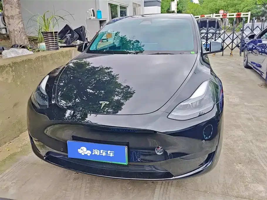 Tesla Model Y — фото 6